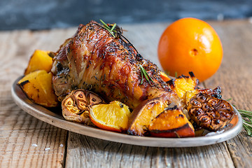 Image showing Thigh of turkey baked with rosemary and orange.