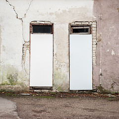 Image showing abandoned wooden house with boarded up windows