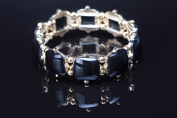 Image showing Bracelet with black  stones over black 