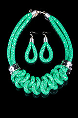 Image showing green Rope Necklace. on black background