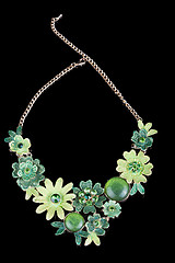 Image showing metal feminine necklace. in the form of flowers