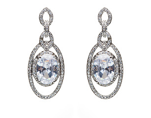 Image showing earrings with blue stones on the white