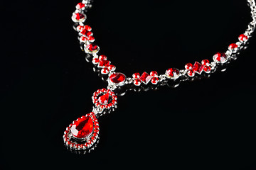 Image showing Vintage pendant with ruby and crystals on   black background