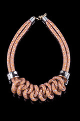 Image showing brown Rope Necklace. on black background