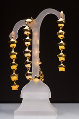 Image showing gold pendant and earrings in the form of stars
