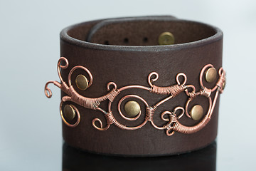 Image showing bracelets. ornaments of copper wire