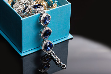 Image showing Bracelet with blue stones in a box 