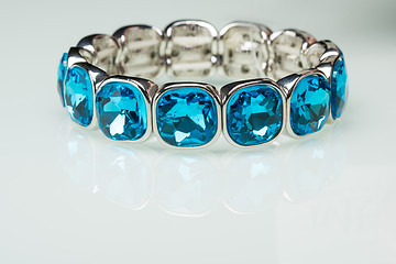 Image showing Bracelet with blue stones over white