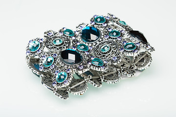 Image showing Bracelet with blue stones over white