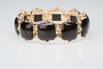 Image showing Bracelet with black  stones over white