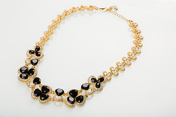 Image showing Necklace with black pearls on a white 