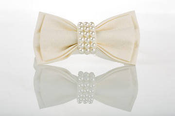 Image showing white bow tie with pearls