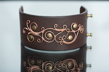 Image showing bracelets. ornaments of copper wire