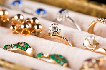 Image showing box with jewelery. Rings and pendants. 