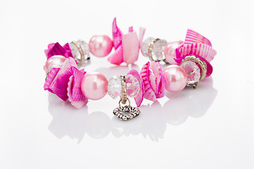 Image showing pink bracelet with pendants 