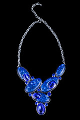 Image showing plastic blue necklace