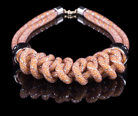 Image showing brown Rope Necklace. on black background