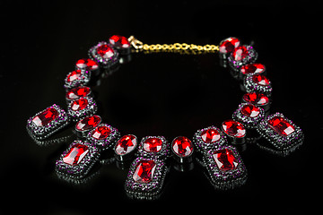 Image showing red plastic  necklace