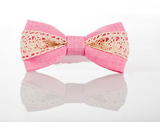 Image showing pink bow tie with white lace