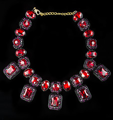 Image showing red plastic  necklace