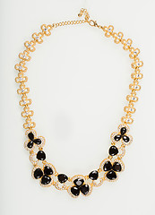 Image showing Necklace with black pearls on a white 