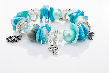 Image showing blue bracelet with pendants 