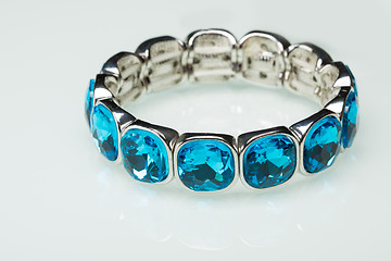 Image showing Bracelet with blue stones over white