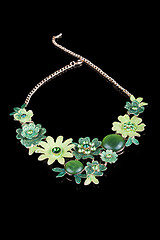 Image showing metal feminine necklace. in the form of flowers