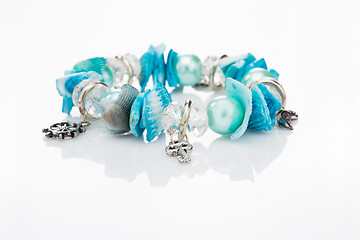 Image showing blue bracelet with pendants 