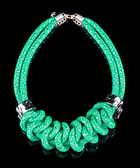 Image showing green Rope Necklace. on black background