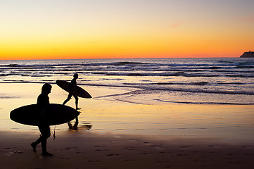 Image showing Surfers at sunset, Portugal