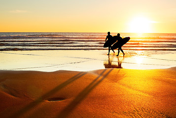 Image showing Surfers on the beach