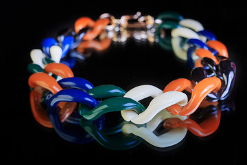 Image showing plastic necklace. multicolored