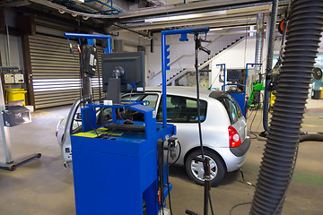 Image showing Car waiting for technical review in garage.