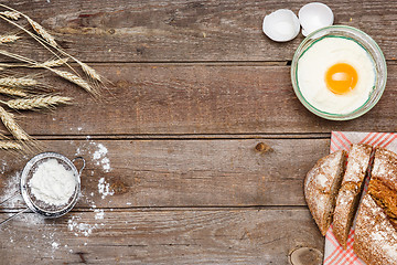 Image showing The bread on an wooden background