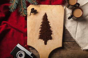 Image showing The two cups of coffee on wooden background