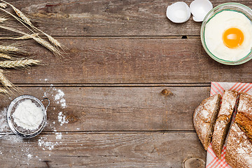 Image showing The bread on an wooden background