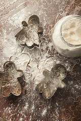 Image showing The gingerbread cookies with copper cookie cutter