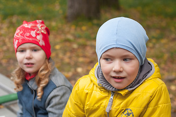 Image showing two children in a park in autumn, portrait
