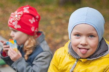 Image showing two children in a park in autumn, portrait