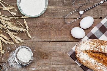 Image showing The bread on an wooden background