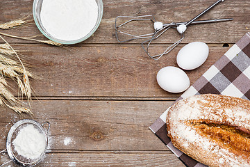 Image showing The bread on an wooden background