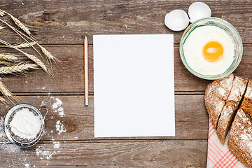 Image showing The bread on an wooden background