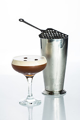 Image showing Layered Chocolate Cocktail with Whipped Cream in Glass Isolated White Background