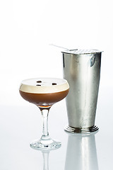 Image showing Layered Chocolate Cocktail with Whipped Cream in Glass Isolated White Background