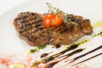 Image showing Grilled steaks and vegetables