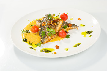 Image showing Grilled Fish with tomato and Mixed Salad