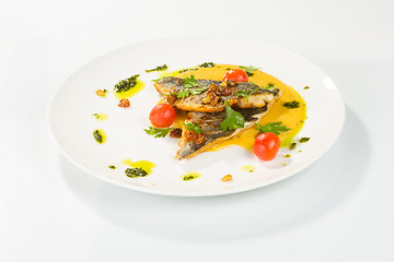 Image showing Grilled Fish with tomato and Mixed Salad