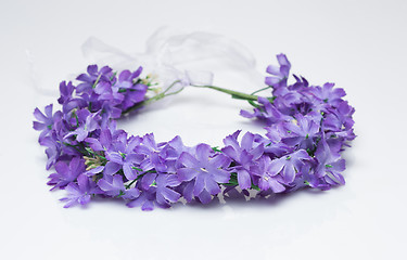 Image showing tiara of artificial  roses on a light background