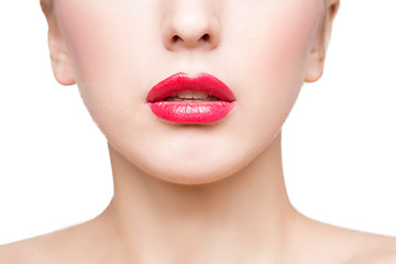 Image showing Sexy beautiful red lips isolated on white background. close-up